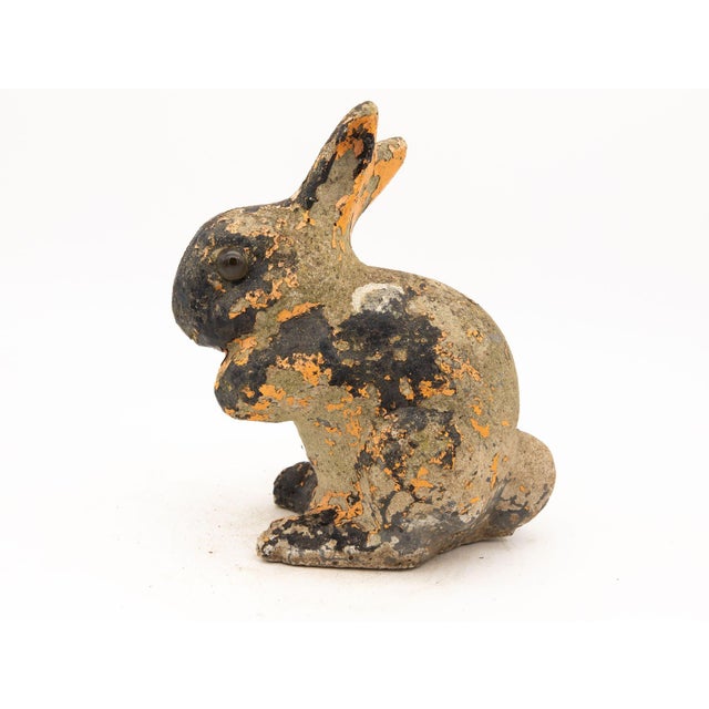 This charming garden ornament takes the shape of an adorable sitting bunny molded from durable concrete. With a touch of...
