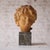 Add classical elegance and sculptural beauty to your space with this early 19th century French terracotta bust with marble...