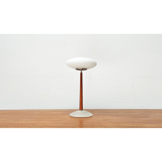 The small T1 table lamp version from the Pao lamp series by Matteo Thun. The Pao lights impress with their characteristic...