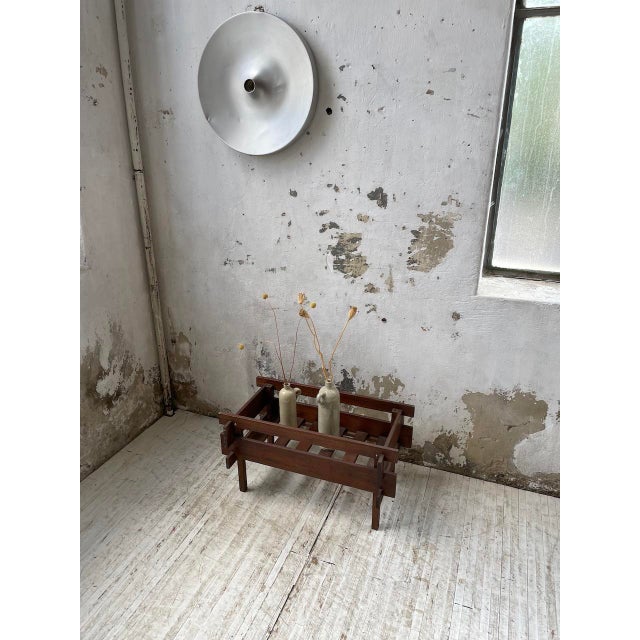 Old small dark oak planter from the 50s. We love its very simple and refined modernist design, totally timeless. Good...