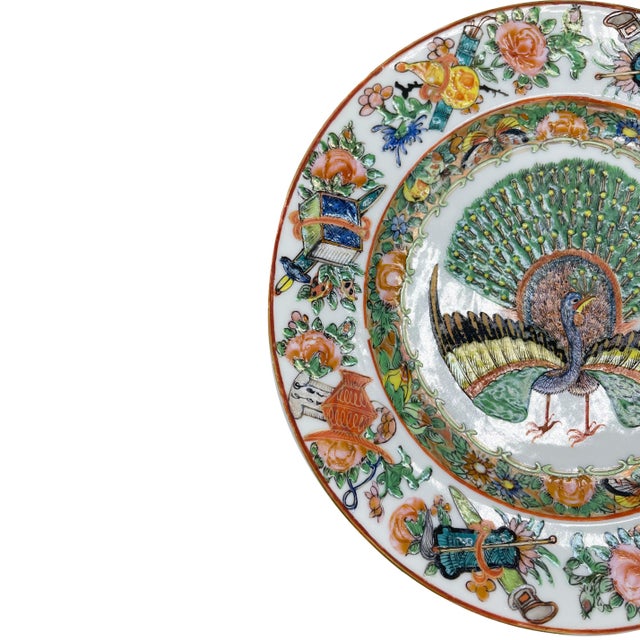 Canton Famille Rose Plate, Qing Dynasty, Tongzhi Era, ca. 1865. The Central Roundel with a Polychrome Enameled Full...