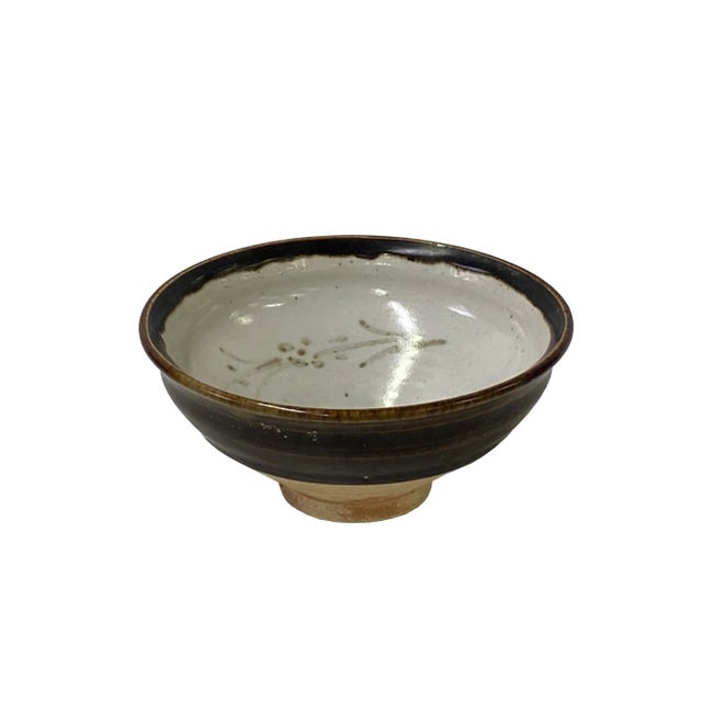 This is a handmade Chinese accent decorative art made of ceramic in brown black mix color with a beige-white inside plant...