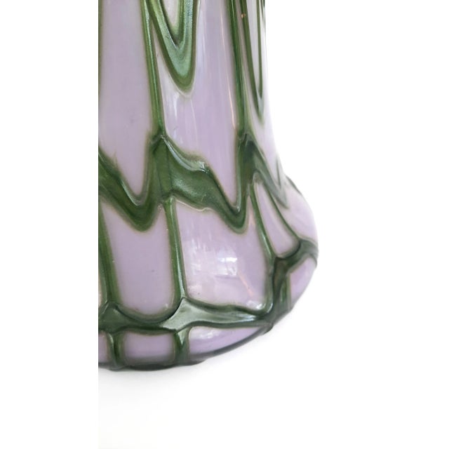 Beautiful art glass vase in lilac pink with green dripping layers of glass.