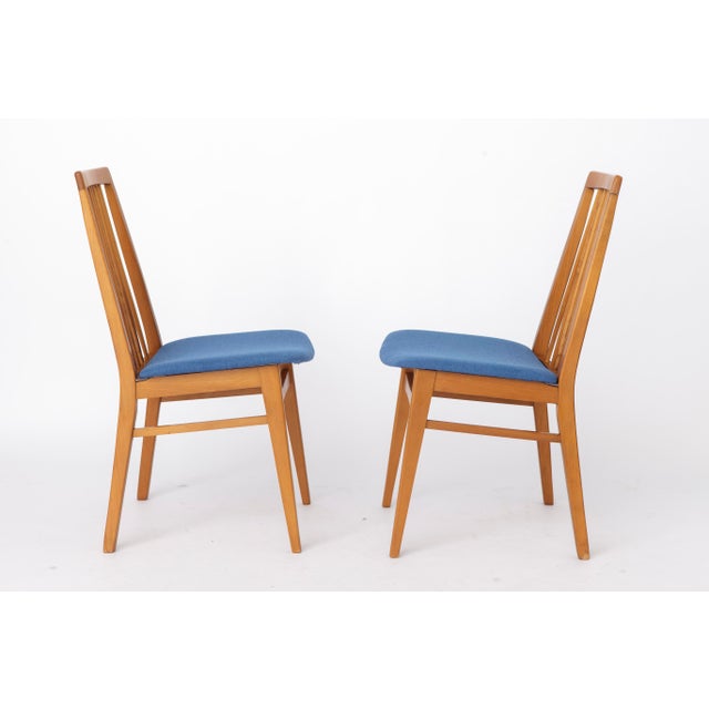 2 of 6 Vintage Dining Chairs, Germany, 1960s. (Unknown manufacturer) The chairs feature sturdy solid beech wood frames...