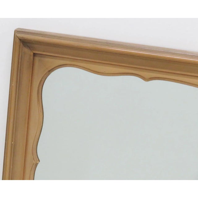 Rectangle French Provincial mirror with scalloped edge design.