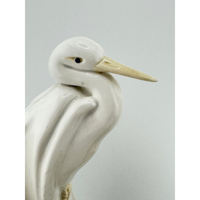 Vintage Fitz & Floyd sculpted crane/ egret candle holders accented with green foliage. These are pre-owned items so please...