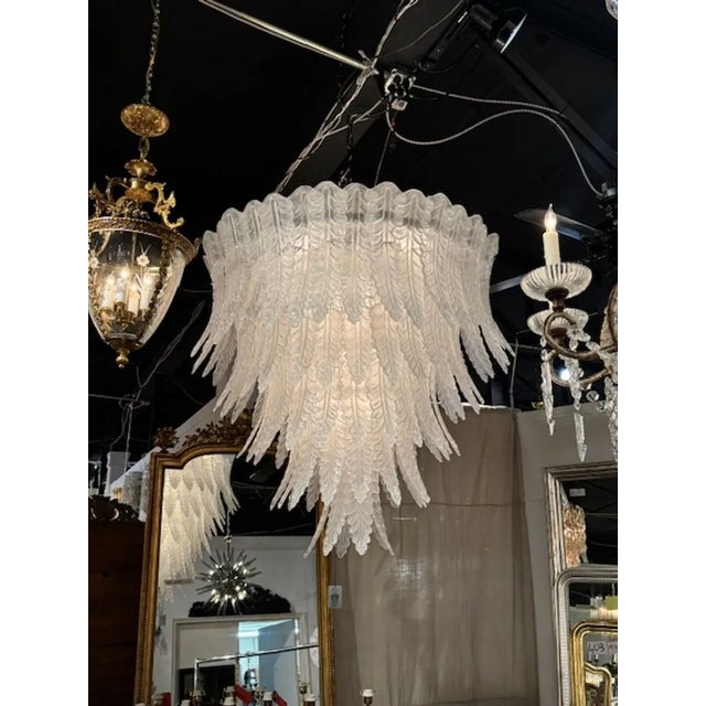 Gorgeous large scale modern Murano palm leaf waterfall chandelier in frost glass. Circa 2000 The chandelier has been...