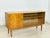 Very beautiful vintage sideboard from the Hellerau 602 series in good condition. with its gorgeous ash wood grain, it...