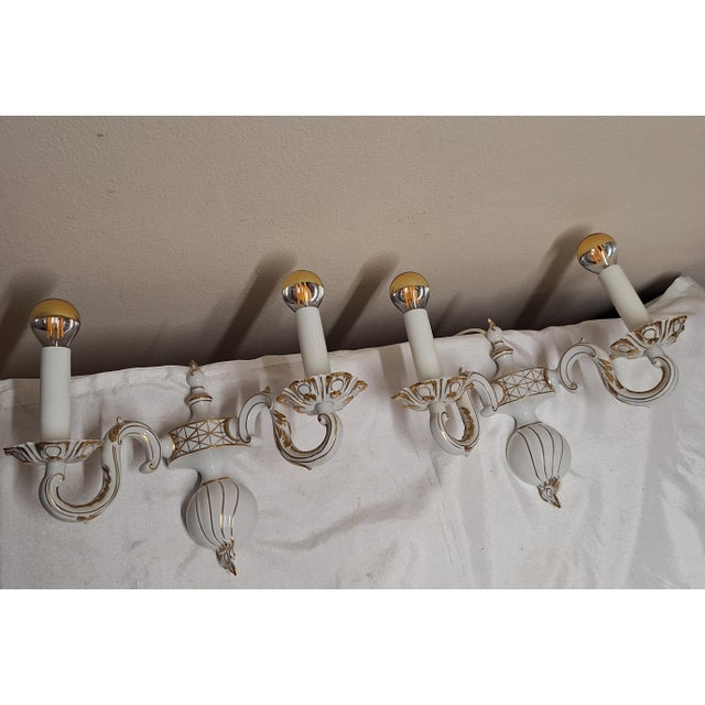 Vintage Wall Lamps in White Glazed Porcelain with Gold Decoration, 1970s, Set of 2, in Very Good conditions. Designed 1970...