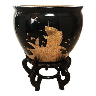 90s Jet Black Gilded Porcelain Planter With a Jumping Koi Motif on Lacquered Wood Stand For Sale