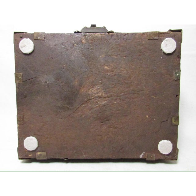 Antique Indian dowry or jewelry box, c.1870 Rectangular in shape with a peaked top and a carrying handle. Having a red...