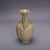 This elegant ceramic ewer is a beautiful decorative piece inspired by traditional Chinese pottery. The vessel features a...