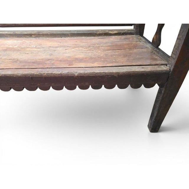 A charming and highly decorative 18th-century French painted wooden bench, distinguished by its generous proportions, high...