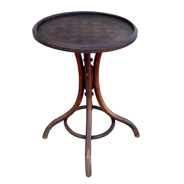 Victorian bentwood Chess Board accent table features a beautifully weathered round top with a subtly raised gallery rim,...