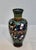 This vintage early 20th century Chinese cloisonné’ vase is beautifully decorated with multiple hand painted colorful...