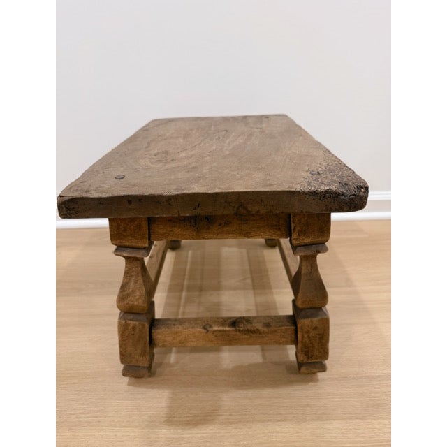 Mid-19th-century French monastery stool with the most beautiful hand-carved details — little scroll carvings and chunky...