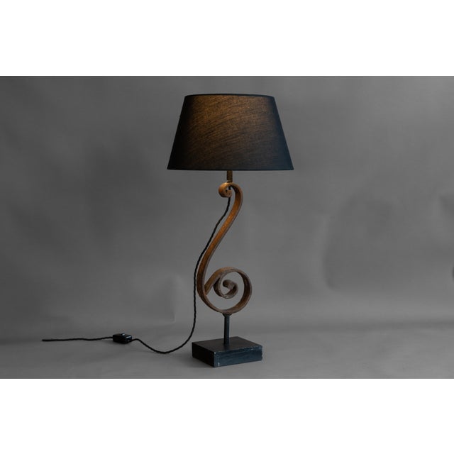 Cast iron antique balustrade in the shape of a quaver with newly fabricated base. Professionally wired and tested. U.K...