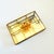 A vintage brass and glass divided box. Features a pressed dried flower arrangement in the lid. A single hinged door with a...