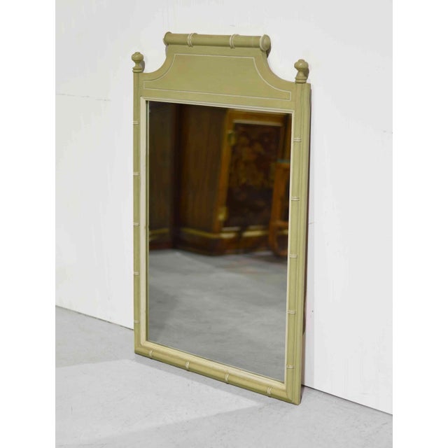 Elegant, timeless, and full of vintage charm, this Hollywood Regency wall mirror by Henry Link brings classic decorative...