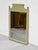 Elegant, timeless, and full of vintage charm, this Hollywood Regency wall mirror by Henry Link brings classic decorative...