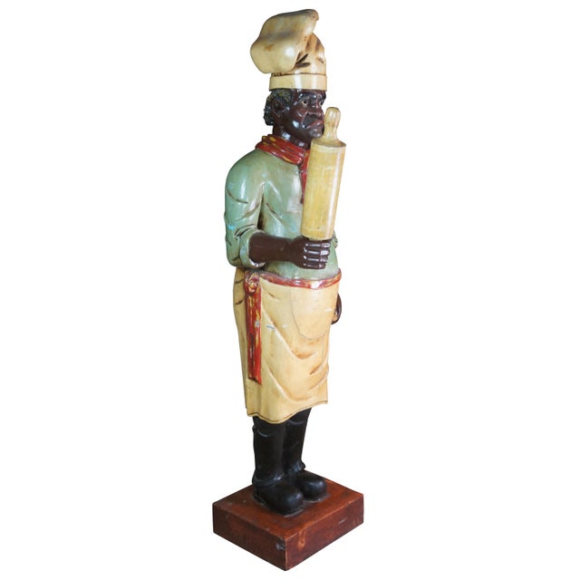 Monumental antique life size chef or baker statue. Carved of wood, featuring a tall chef with traditional French kitchen...