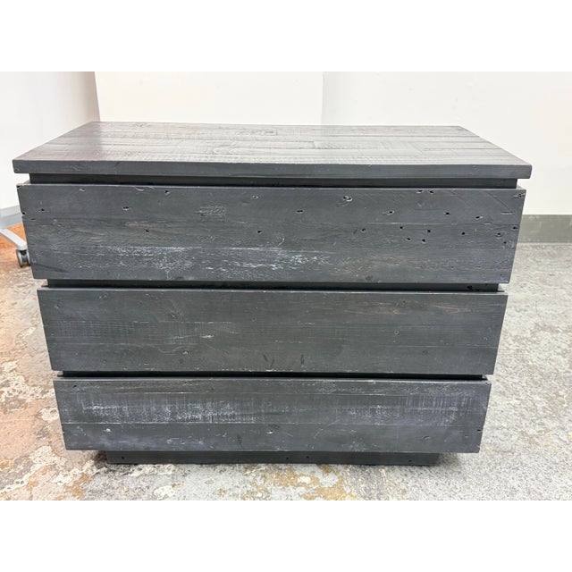 Design Plus Gallery presents the Plank Wood Dresser from West Elm. The rectangular wood case displays pronounced grain,...