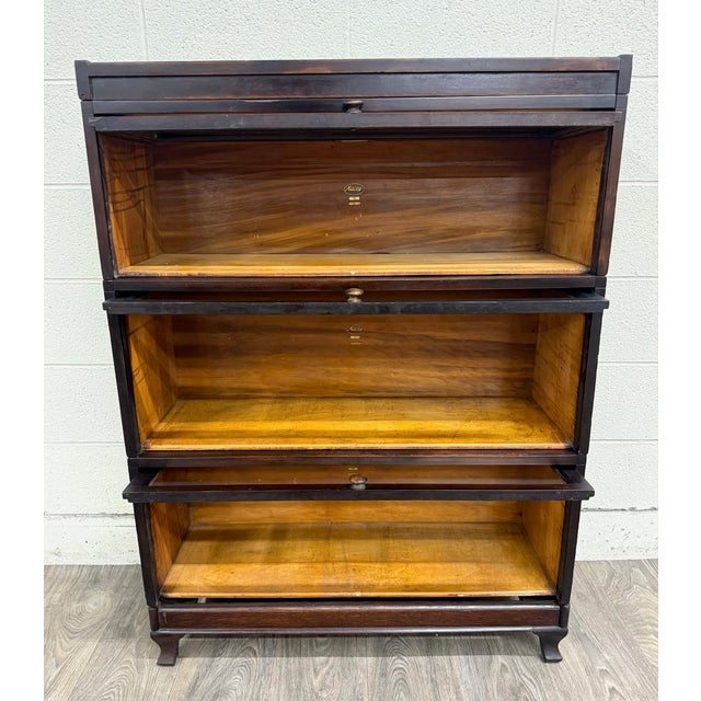 This is an authentic and gorgeous antique Macey barrister bookcase or lawyer bookcase dating to the early 20th century....