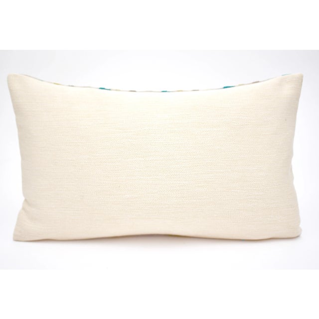 Beautifully handmade 20" x 12" "Celtic" cut velvet pillow in "Peacock" from The Design Connection. Features a gorgeous...