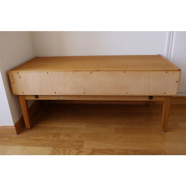 Low sideboard or small Scandinavian TV stand (origin: Denmark), 1960s. In excellent condition despite its age. It features...