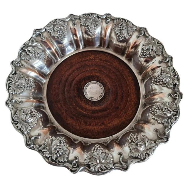 A handsome pair of antique english wine or spirit bottle coasters dating to circa the 1830s, during the reign of george...