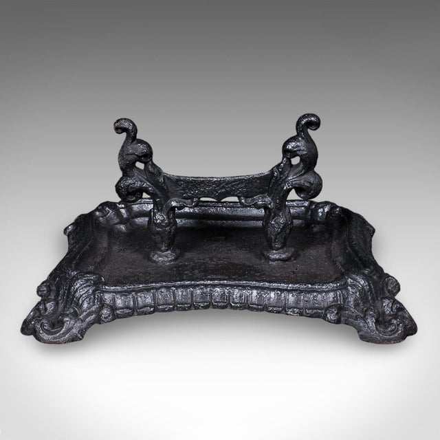 This is an antique townhouse boot cleaner. An English, cast iron Great Exhibition doorway shoe scraper and pull, dating to...