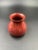 Signed Delft art studio petite pottery vase. Of baluster form. Glazing is in a radiant & beautiful Red with gold...