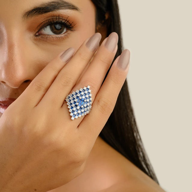 Elevate your jewelry collection with this striking cocktail ring featuring dazzling Cubic Zirconia gemstones set in high-...