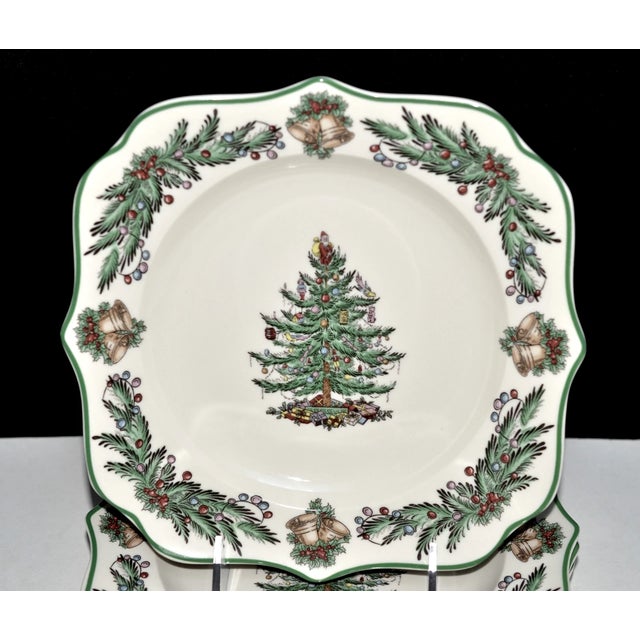 Add festive elegance to your holiday table with this set of four Spode Christmas Tree Garland square salad plates....