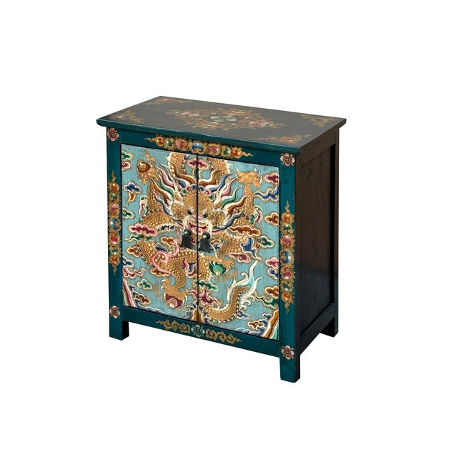 This cabinet/table is painted with colorful (distressed Teal Green and light green celadon base ) Tibetan style flower &...