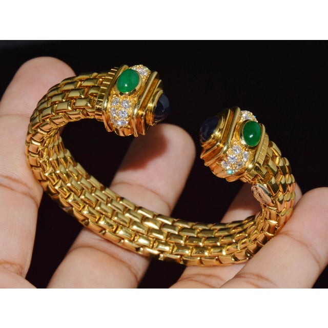 Authentic vintage FOPE Flex’it solid 18K yellow gold natural diamond, sapphire, and emerald open cuff bangle bracelet....