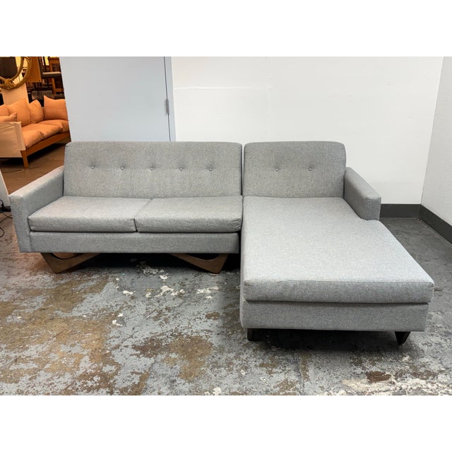 Design Plus Gallery presents the Brooklyn Sectional Sofa from Sofa Creations. Upholstered in a light gray woven textile,...