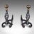 This is large pair of antique fire dogs. An English, cast iron and brass andiron in Aesthetic Period taste, dating to the...