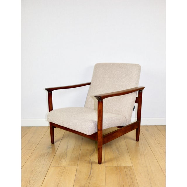 - A vintage easy chair - model GFM-142 - Designed by Edmund Homa - from the 1970s - Reupholstered in structural fabric in...