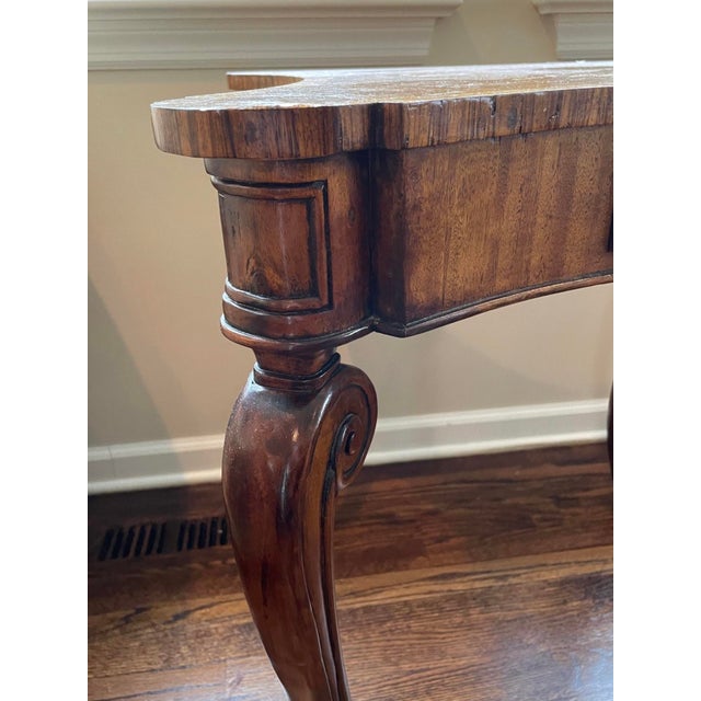 A vintage burl wood walnut side table with a concave-sided top with an intricate marquetry radiating sunburst center...