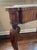 A vintage burl wood walnut side table with a concave-sided top with an intricate marquetry radiating sunburst center...