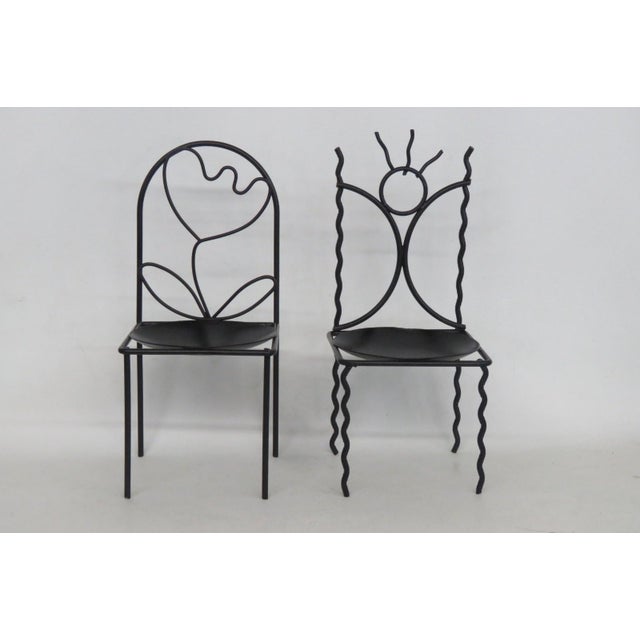 This darling Pair of 2 Candle Holders are made of metal. These lovely Candle Holders present a chair-shaped design for a...