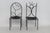 This darling Pair of 2 Candle Holders are made of metal. These lovely Candle Holders present a chair-shaped design for a...