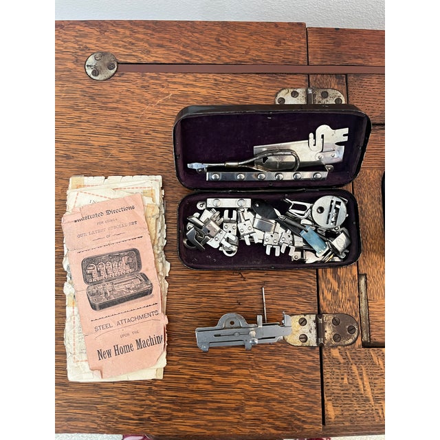 Antique 1903 'New Home' Treadle Sewing Machine Series B in Oak Cabinet Working Condition For Sale - Image 11 of 12