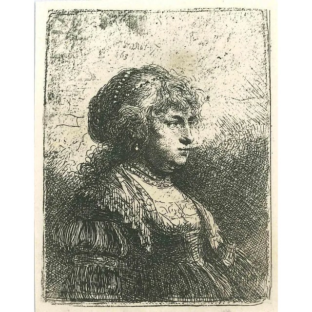 Saskia with the Pearl is an engraving on ivory-colored paper realized by Charles Amand Durand after an etching by...
