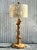 This vintage burl knot table lamp is a true statement piece, showcasing the natural beauty of richly textured burl wood....