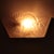 A set of two Degue Art Deco wall lights with geometric floral motifs in the glass. The metal is re-nickeled brass....
