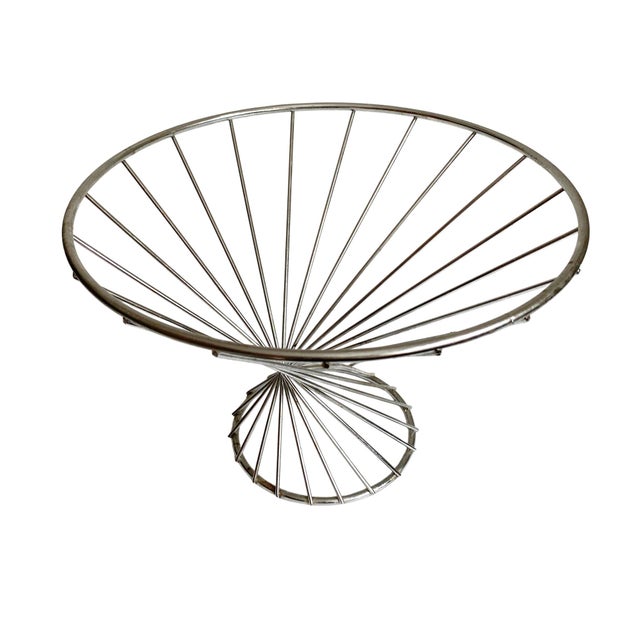Elevate your home organization with the Twisted Chrome Wire Basket, a stunning blend of minimalist design and 1970s...