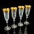 This is a striking set of 12 vintage champagne flutes. A Continental, gold leaf coated wine glass suite, dating to the...