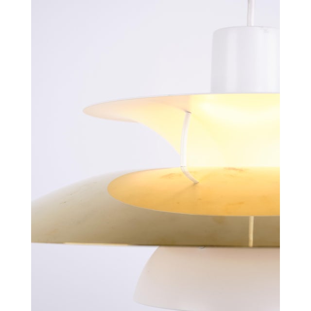 Ph 5 pendant in brass from louis poulsen designed by poul henningsen. Classic danish lamp with glare-free and functional...